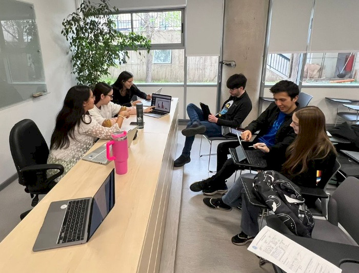 A group of people in a classroom.